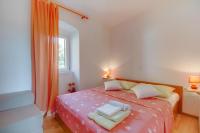 Postel nebo postele na pokoji v ubytování Apartments with a parking space Mali Losinj (Losinj) - 8053