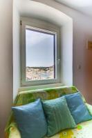 Postel nebo postele na pokoji v ubytování Apartments with a parking space Mali Losinj (Losinj) - 8053