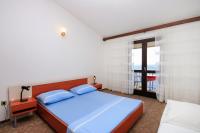 Postel nebo postele na pokoji v ubytování Apartments by the sea Prizba, Korcula - 9227