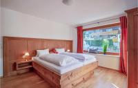 A bed or beds in a room at Großes Ferienhaus St, Gallenk,