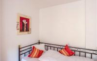 A bed or beds in a room at Großes Ferienhaus St, Gallenk,