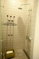 a bathroom with a shower with a towel rack at Bay of Stars in Ji&#39;an