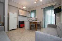 A kitchen or kitchenette at Vasileiou Apartments