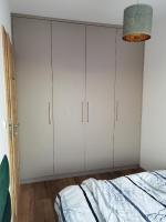 Posteľ alebo postele v izbe v ubytovaní Apartament Olecko Centrum