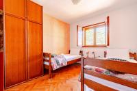 Łóżko lub łóżka w pokoju w obiekcie Apartments by the sea Tri Zala, Korcula - 9317