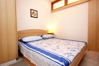 Posteľ alebo postele v izbe v ubytovaní Apartments by the sea Sevid, Trogir - 9468