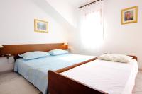 Posteľ alebo postele v izbe v ubytovaní Apartments by the sea Sevid, Trogir - 9468