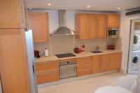 Kuchyň nebo kuchyňský kout v ubytování Lovely 2 bedroom unit with private pool