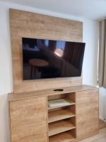 Telewizja i/lub zestaw kina domowego w obiekcie Hotel Tilia