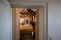 a hallway with a hallway leading to a room at Studio Loft Murau - im Herzen der Altstadt in Murau