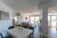 Posedenie v ubytovaní Lisasol Apartamento nuevo con vistas al mar