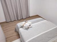 Postel nebo postele na pokoji v ubytování BAJ - Apartamentos en Playa Bajondillo, Torremolinos