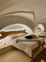 A bed or beds in a room at Il Nachiro