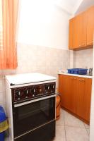 Kuchyňa alebo kuchynka v ubytovaní Apartments by the sea Sreser, Peljesac - 10138