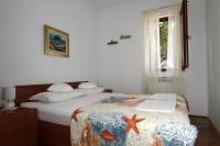 Posteľ alebo postele v izbe v ubytovaní Apartments by the sea Trogir - 11895