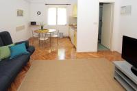 Televízia a/alebo spoločenská miestnosť v ubytovaní Apartments by the sea Trogir - 11895
