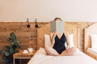 A bed or beds in a room at Wellness Refugium & Resort Hotel Alpin Royal - Small Luxury Hotels of the World