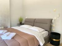 Posteľ alebo postele v izbe v ubytovaní Apt w/ View of OlympusZeusTemple/4BEDR-3BATH-2KITC