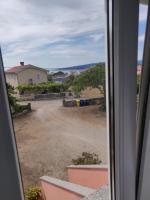 a view from a window of a yard at Apartment Nenadic in Hrahorić