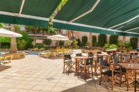 A restaurant or other place to eat at Hotel Guitart Rosa - Adults Only