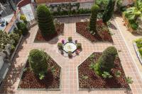 A garden outside Hotel Guitart Rosa - Adults Only