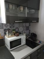 Kuchnia lub aneks kuchenny w obiekcie Le logis du clocher