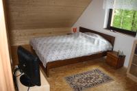 Postel nebo postele na pokoji v ubytování Chata na řece Sázavě
