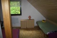 Postel nebo postele na pokoji v ubytování Chata na řece Sázavě