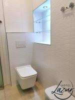 Koupelna v ubytování Lazur Apartamenty