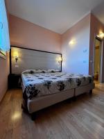 Posteľ alebo postele v izbe v ubytovaní Villa Clorè Hotel & Spa