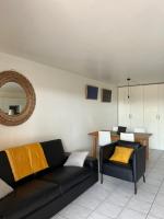 Posedenie v ubytovaní Appartement à 50 mètres de la Plage des Estagnots à Seignosse, Landes