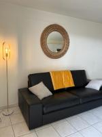 Posedenie v ubytovaní Appartement à 50 mètres de la Plage des Estagnots à Seignosse, Landes
