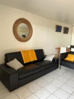 Posedenie v ubytovaní Appartement à 50 mètres de la Plage des Estagnots à Seignosse, Landes