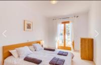 Postel nebo postele na pokoji v ubytování Villa Cortés cerca del Mar
