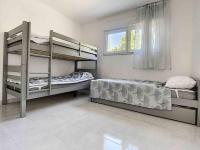 Posteľ alebo postele v izbe v ubytovaní La villa petite Camargue