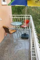 Balkón alebo terasa v ubytovaní Family friendly apartments with a swimming pool Vinisce, Trogir - 12676