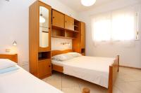 Cama ou camas em um quarto em Apartments with a parking space Seget Vranjica, Trogir - 12760