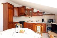 A cozinha ou cozinha compacta de Apartments with a parking space Seget Vranjica, Trogir - 12760