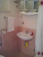 Kúpeľňa v ubytovaní Apartment Sumartin 11658b