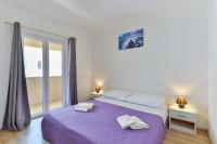 Posteľ alebo postele v izbe v ubytovaní Apartment Nin 13172c