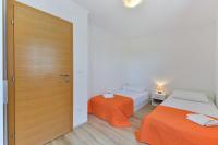 Posteľ alebo postele v izbe v ubytovaní Apartment Nin 13172c