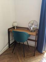 a desk with a fan and a chair with a fan at Amazing 2-bedroom apartment in Nice near the beach in Nice
