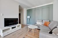Televízia a/alebo spoločenská miestnosť v ubytovaní Grand Apartments - Brabank Apartments