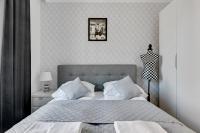 Posteľ alebo postele v izbe v ubytovaní Grand Apartments - Brabank Apartments