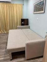 Postel nebo postele na pokoji v ubytování Cozy Apartment Metaxourgeio greendom