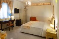 Hotel Trinacriaにあるベッド