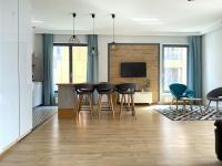 Televízia a/alebo spoločenská miestnosť v ubytovaní Grand Apartments - Brabank Apartments