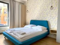 Posteľ alebo postele v izbe v ubytovaní Grand Apartments - Brabank Apartments