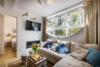 Posedenie v ubytovaní APARTAMENT 20B BLUE MARINE Poddąbie Basen Odkryty Brodziki Plac Zabaw dwie sypialnie