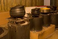 a group of pots and pans on a stove at Manong Game Lodge in Gaborone